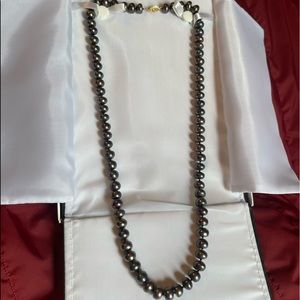 Black rainbow strand of pearls